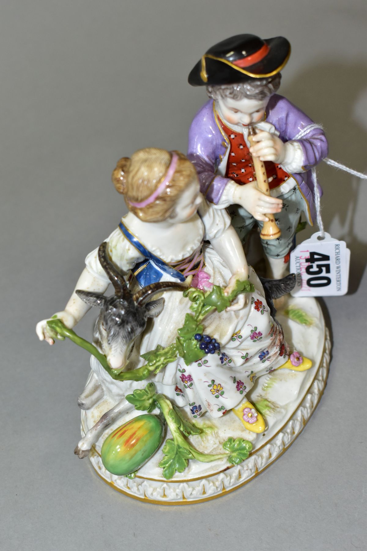 A LATE 19TH CENTURY MEISSEN FIGURE GROUP OF A BOY AND A GIRL WITH A GOAT, the boy playing a wind - Image 6 of 11