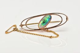 AN OPAL BROOCH, rose gold tone brooch of an openwork centring on an oval opal cabochon set at an