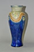 A ROYAL DOULTON STONEWARE VASE, blue, green and brown glazes with raised foliate design and beaded