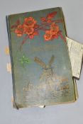 POSTCARDS, approximately 340 early 20th century Postcards in a distressed album featuring