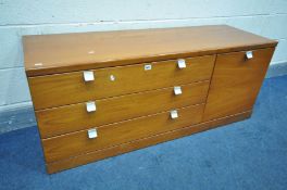 A MID-CENTURY TEAK SIDEBOARD, with three drawers besides a single cupboard door, width 138cm x depth