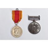 A PAIR OF FIRE SERVICE MEDALS, one medal commemorating exemplary service with a red and yellow