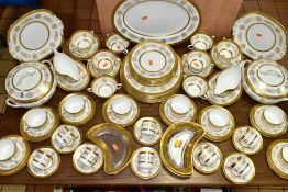 AN EIGHTY NINE PIECE COALPORT LADY ANNE DINNER SERVICE, with tooled gilt bands around scrolling
