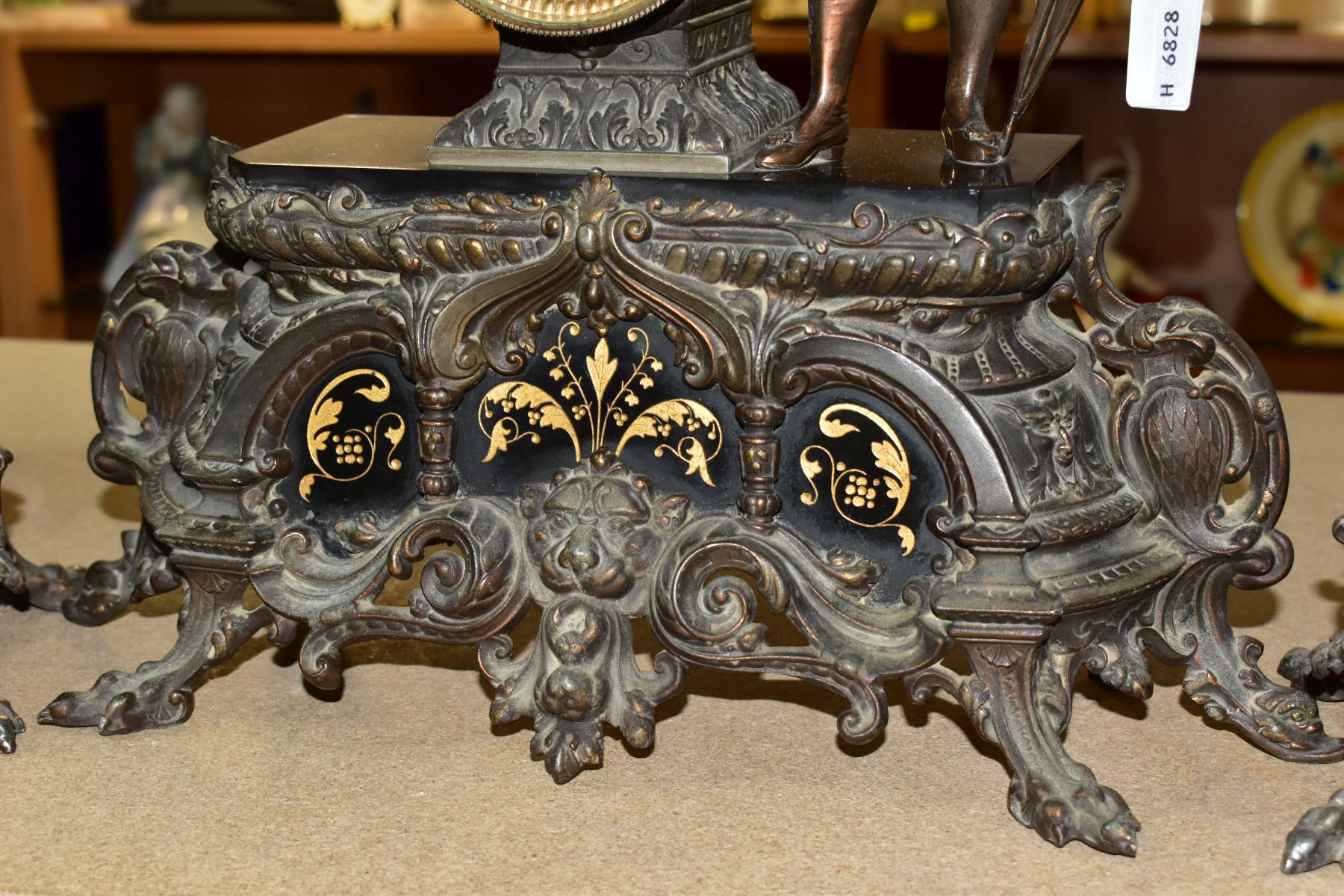 A LATE 19TH CENTURY BRONZED SPELTER AND BLACK SLATE CLOCK GARNITURE, the mantel clock with figure of - Image 9 of 14