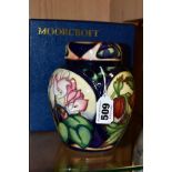A LIMITED EDITION MOORCROFT POTTERY GINGER JAR AND COVER, Ashwood Gold pattern designed by Emma