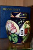 A LIMITED EDITION MOORCROFT POTTERY GINGER JAR AND COVER, Ashwood Gold pattern designed by Emma