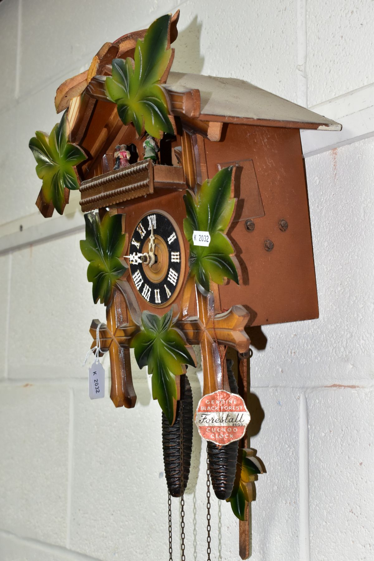 A FORESTALL CUCKOO CLOCK, with dancing couples, pinecone weights and original tag (Condition report: - Image 3 of 5
