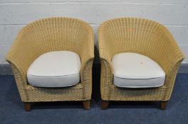 A PAIR OF WICKER TUB CHAIRS with cream cushions