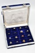 A BLUE VELVET JEWELLERY DISPLAY CASE WITH CONTENTS, blue velvet case opens to reveal sixteen ring