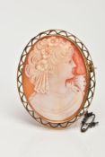 A PORTRAIT CAMEO BROOCH, set in an a 9ct gold open work mount, portrait depicting a lady facing to