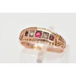 AN EARLY 20TH CENTURY 9CT GOLD FIVE STONE RING, designed with a row of three circular cut red