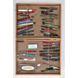 THIRTY ONE VINTAGE AND MODERN FOUNTAIN PENS in a bespoke hinged wooden display case, the pens
