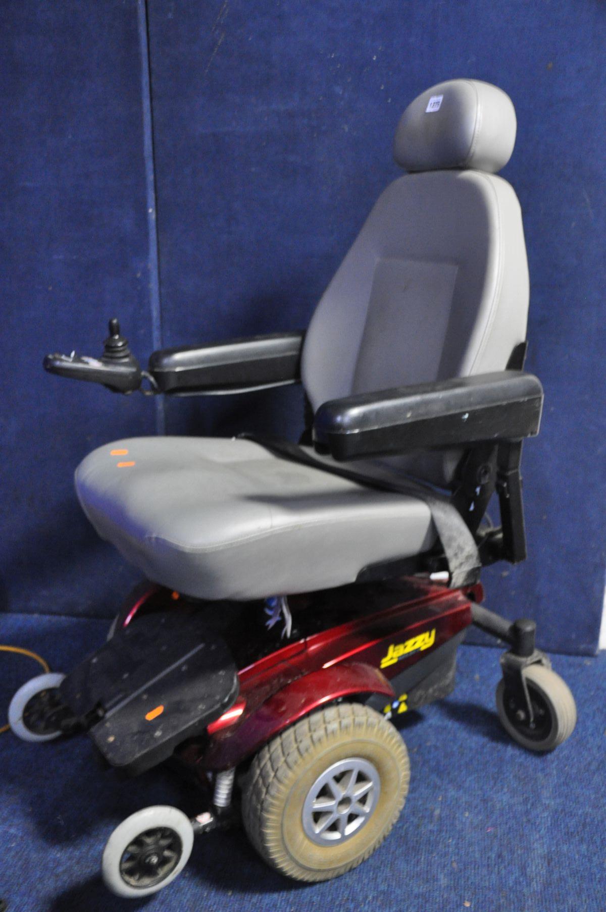 A JAZZY SELECT MOTORIZED WHEELCHAIR with two chargers (PAT fail due to not charging so untested)