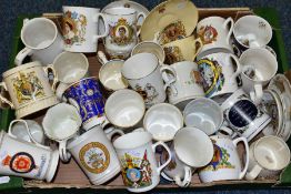 A BOX OF ROYAL COMMEMORATIVE CERAMIC WARES, to include over thirty pieces, two mugs designed by Dame