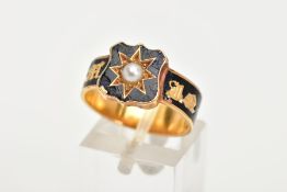 A YELLOW METAL PEARL AND ENAMEL MOURNING RING, designed with a shield shaped head centring on a star