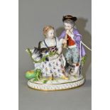 A LATE 19TH CENTURY MEISSEN FIGURE GROUP OF A BOY AND A GIRL WITH A GOAT, the boy playing a wind