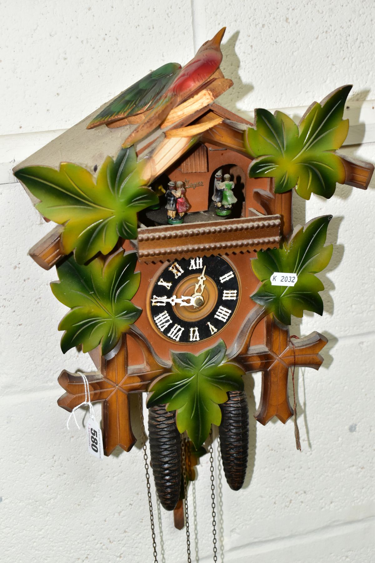 A FORESTALL CUCKOO CLOCK, with dancing couples, pinecone weights and original tag (Condition report: - Image 2 of 5