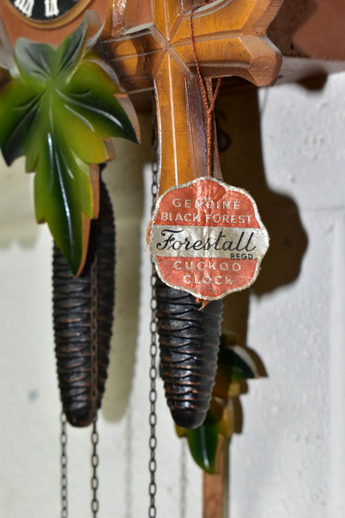 A FORESTALL CUCKOO CLOCK, with dancing couples, pinecone weights and original tag (Condition report: - Image 4 of 5