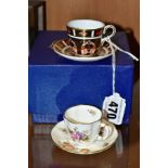A BOXED ROYAL CROWN DERBY IMARI MINIATURE CUP AND SAUCER, 1128 pattern, date cypher for 1991,