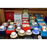 A COLLECTION OF BOXED AND LOOSE MINIATURE TEA CUPS, SAUCERS, MUGS, WATERING CAN, ETC, mostly