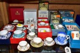 A COLLECTION OF BOXED AND LOOSE MINIATURE TEA CUPS, SAUCERS, MUGS, WATERING CAN, ETC, mostly