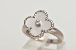 A VAN CLEEF & ARPELS VINTAGE ALHAMBRA RING WITH BOX, with mother of pearl motif and central collet