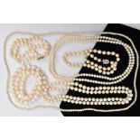 SIX STRANDS OF CULTURED PEARLS, to include two strands of white pearls individually knotted,