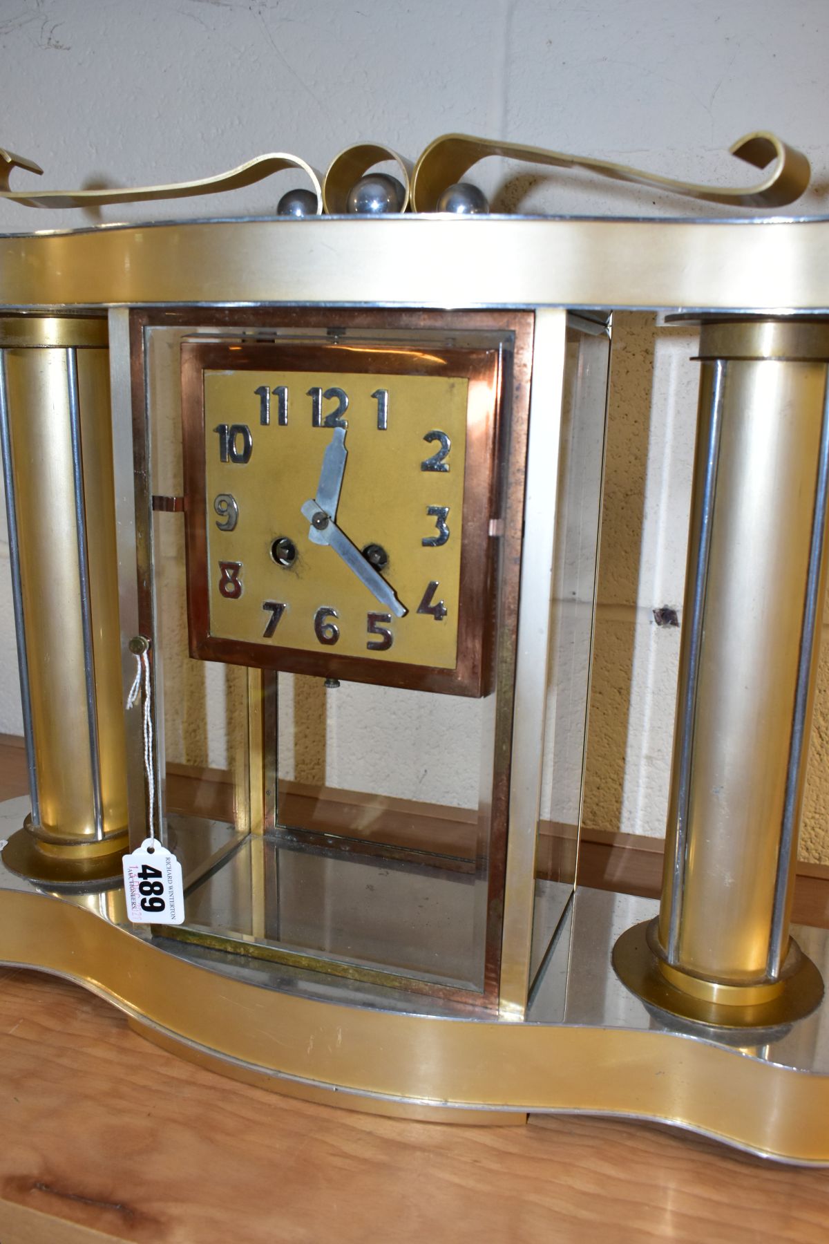 AN ART DECO STYLE CLOCK GARNITURE, the gold coloured metal case with chromed details, Arabic - Image 6 of 10