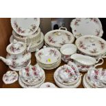 A SIXTY TWO PIECE ROYAL ALBERT LAVENDER ROSE PART DINNER SERVICE, comprising two tureens, sauce