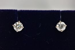 A MODERN PAIR OF 18CT WHITE GOLD DIAMOND STUD EARRINGS, estimated total modern round brilliant cut