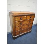 A VICTORIAN FLAME MAHOGANY CHEST OF TWO SHORT OVER THREE LONG DRAWERS, with a slopped top, turned