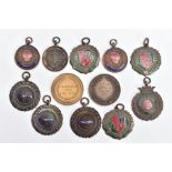 TWELVE RUNNING MEDALS, awarded to A.S.Dunn, medals for various distances and years