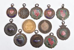 TWELVE RUNNING MEDALS, awarded to A.S.Dunn, medals for various distances and years