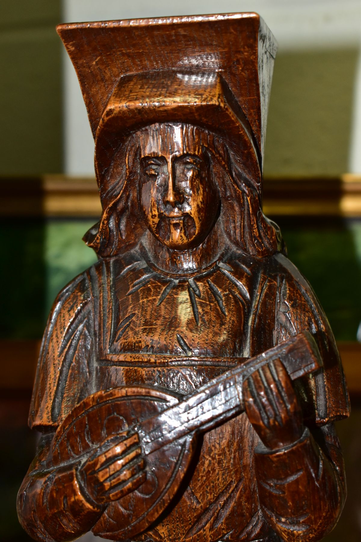 A PAIR OF CARVED OAK CORBELS OF MALE AND FEMALE MUSICIANS TOGETHER WITH THREE PICTURES AND A PEDAL - Image 3 of 5