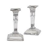 A pair of silver candlesticks, Sheffield, c.1910, Fordham & Faulkner, of short, columnar form, the