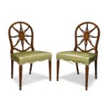 A pair of George III mahogany side chairs, in the manner Henry Hill of Marlborough, the pierced