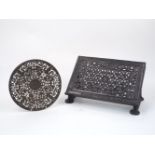 A cast iron table lectern, 19th century, designed with pierced stylised foliate trellice pattern