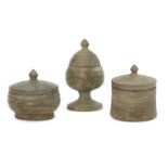 Three Chinese bronze miniature votive covered vessels, Late Six dynasties - Early Tang dynasty,