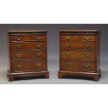 A pair of George III style mahogany bachelor's chests, late 20th Century, the crossbanded