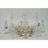 A selection of mid-20th century and later glass decanters and jugs, to include, a brown glass