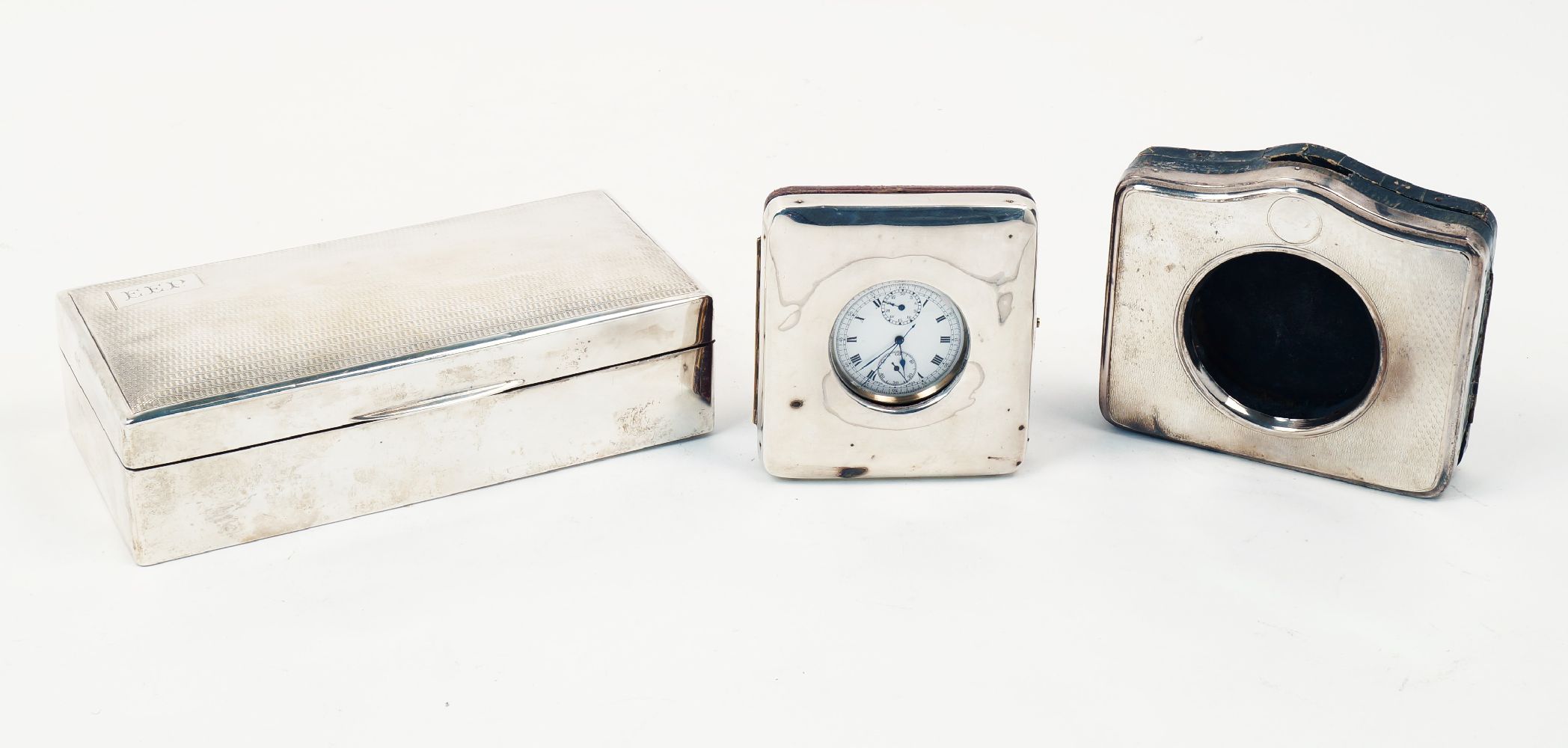 A silver cigarette box, Birmingham, c.1927, Deakin & Francis, of rectangular form with wood-lined