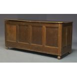 A George III style four panel blanket box, first half 20th Century, the hinged triple plank lid,