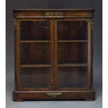 A Victorian walnut, inlaid and gilt metal mounted pier cabinet, the rectangular top above frieze