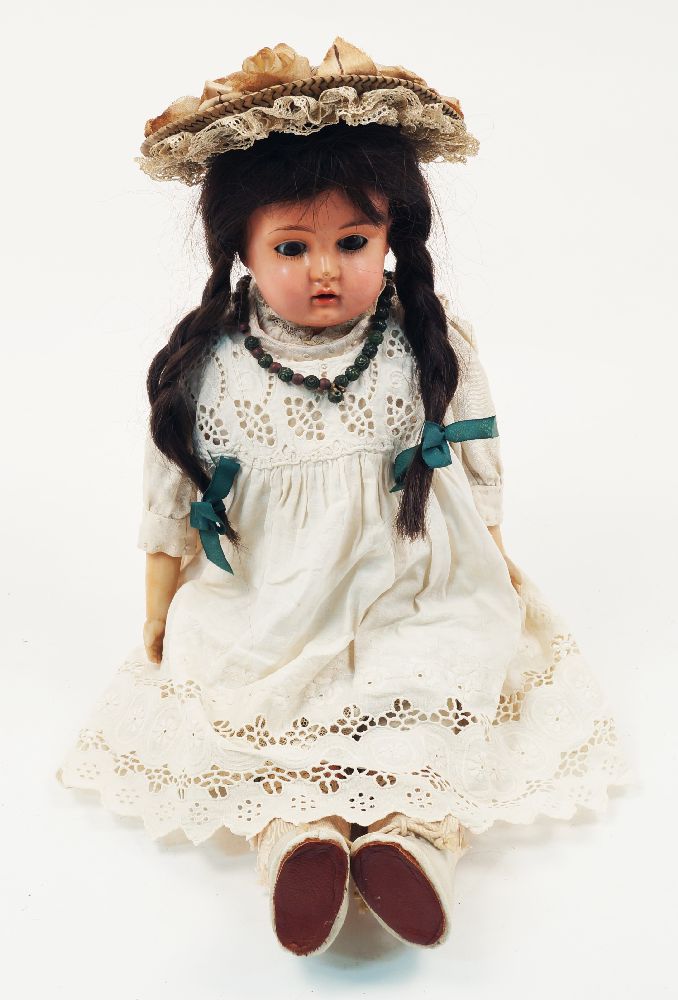 A Johann Daniel Kestner doll, 20th century, with brown sleeping eyes, open mouth and teeth, brown