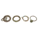 Five Chinese bronze bracelets, Neolithic period, one with chevron design, two cast with bells, 4.5cm
