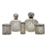 Five silver mounted cut glass vessels, comprising two globular bottles with glass stoppers and