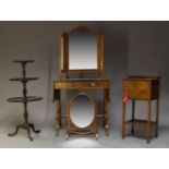 A Regency style mahogany and line inlaid sofa table, the top with two drop leaves above two frieze