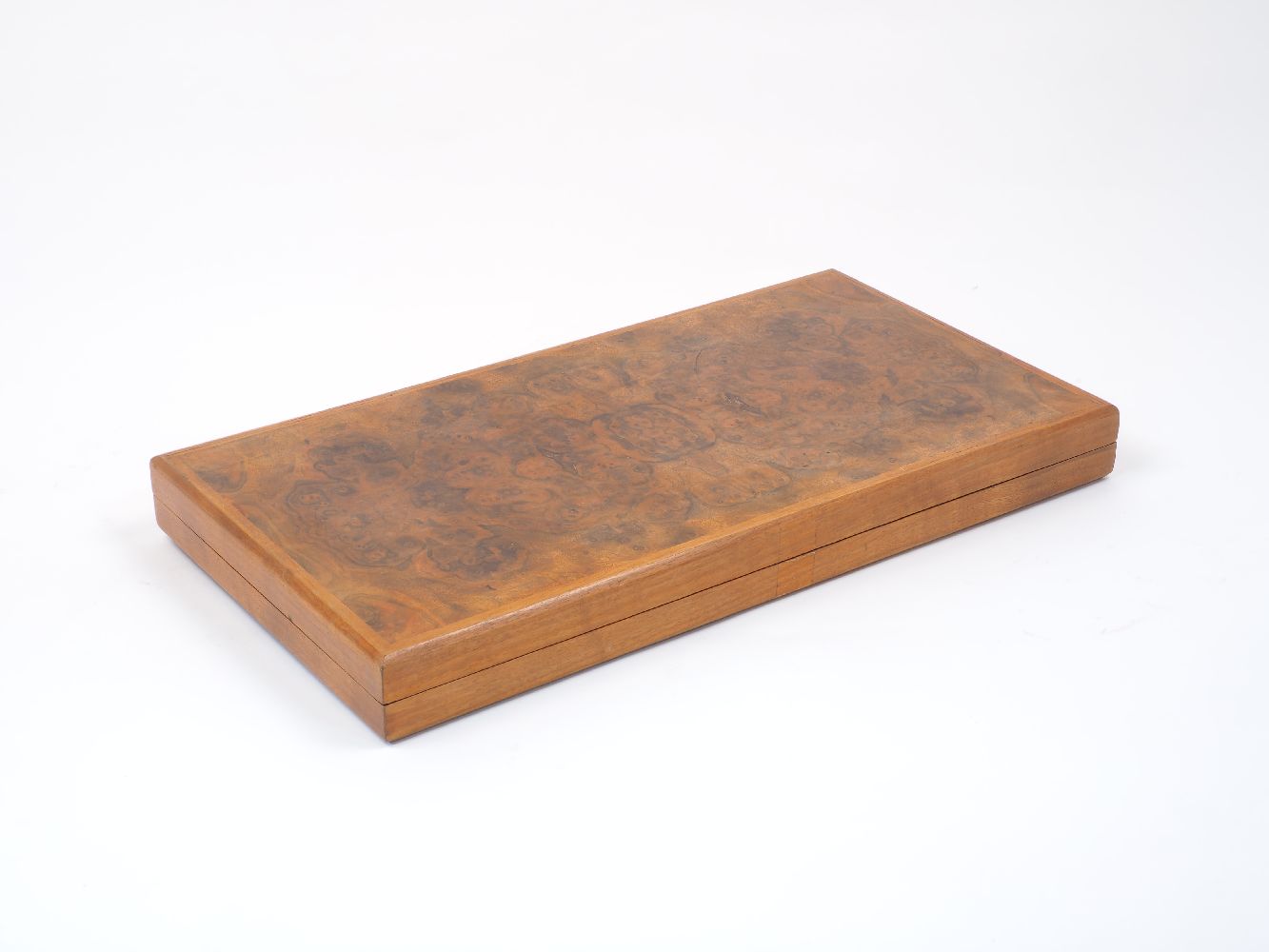 A walnut travelling backgammon board, 20th century, of typical form, the quarter cut veneered - Image 2 of 2