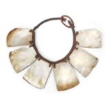 An Ifugao pangalapang necklace, Philippines, designed with six mother of pearl rectangular panels,