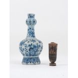 A Delft vase, late 18th century/early 19th century, the baluster body rising to slender neck with an